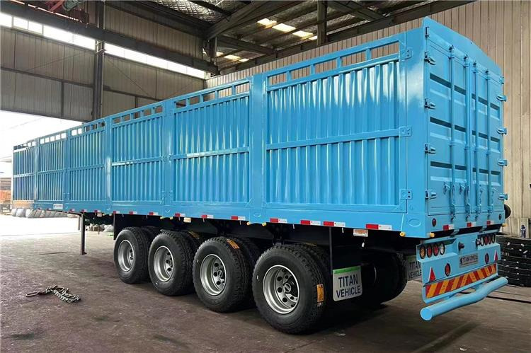 TITAN 4 Axle Fence Semi Truck Trailer for Sale price In Rwanda - Puspiekabe dzīvnieku pārvadāšanai: foto 1 TITAN 4 Axle Fence Semi Truck Trailer for Sale price In Rwanda - Puspiekabe dzīvnieku pārvadāšanai: foto 1
