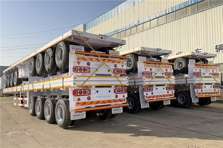TITAN 4 Axle Flatbed Trailer for Sale In Saudi Arabia - Bortu puspiekabe/ Platforma: foto 1 TITAN 4 Axle Flatbed Trailer for Sale In Saudi Arabia - Bortu puspiekabe/ Platforma: foto 1