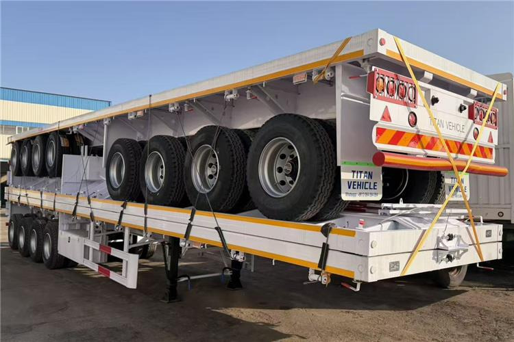 TITAN 4 Axle Flatbed Trailer for Sale In Saudi Arabia - Bortu puspiekabe/ Platforma: foto 5 TITAN 4 Axle Flatbed Trailer for Sale In Saudi Arabia - Bortu puspiekabe/ Platforma: foto 5