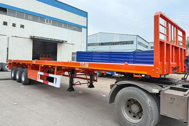 TITAN 40Ft Flatbed Trailer for Sale Price in Jamaica - Bortu puspiekabe/ Platforma: foto 1 TITAN 40Ft Flatbed Trailer for Sale Price in Jamaica - Bortu puspiekabe/ Platforma: foto 1