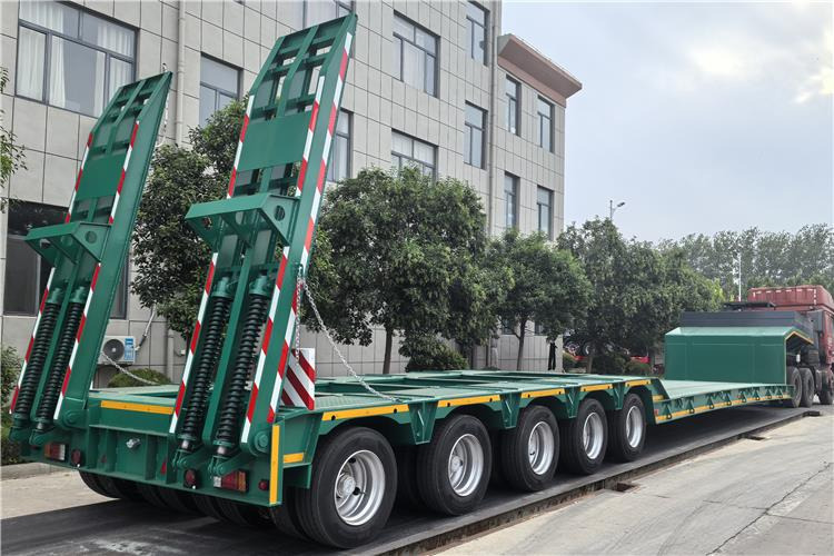 TITAN 5 Axle Low Bed Trailer for Sale In Nigeria - Puspiekabe zema profila platforma: foto 1 TITAN 5 Axle Low Bed Trailer for Sale In Nigeria - Puspiekabe zema profila platforma: foto 1