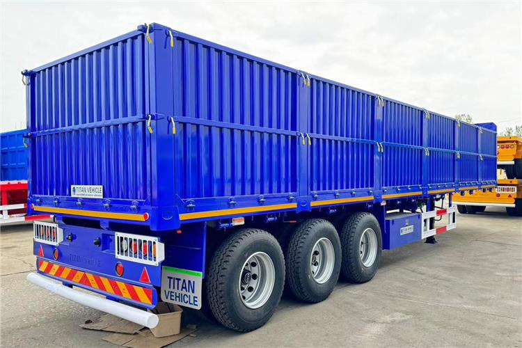 TITAN 80 Ton Side Wall Trailer for Sale Price In United Arab Emirates - Bortu puspiekabe/ Platforma: foto 1 TITAN 80 Ton Side Wall Trailer for Sale Price In United Arab Emirates - Bortu puspiekabe/ Platforma: foto 1