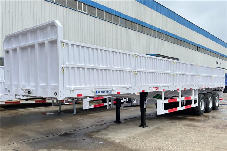 TITAN Tri Axle Dropside Trailer For Sale In Nigeria Lagos - Bortu puspiekabe/ Platforma: foto 1 TITAN Tri Axle Dropside Trailer For Sale In Nigeria Lagos - Bortu puspiekabe/ Platforma: foto 1