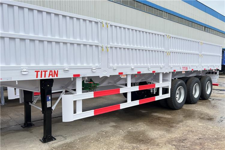 TITAN Tri Axle Dropside Trailer For Sale In Nigeria Lagos - Bortu puspiekabe/ Platforma: foto 5 TITAN Tri Axle Dropside Trailer For Sale In Nigeria Lagos - Bortu puspiekabe/ Platforma: foto 5