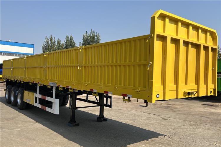 TITAN Triple Axle Trailer with Drop Side Trailer for Sale In Ghana - Bortu puspiekabe/ Platforma: foto 1 TITAN Triple Axle Trailer with Drop Side Trailer for Sale In Ghana - Bortu puspiekabe/ Platforma: foto 1