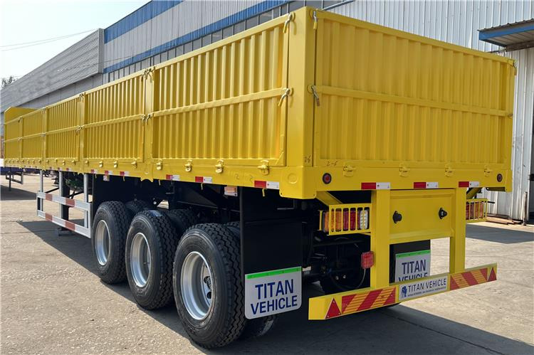 TITAN Triple Axle Trailer with Drop Side Trailer for Sale In Ghana - Bortu puspiekabe/ Platforma: foto 4 TITAN Triple Axle Trailer with Drop Side Trailer for Sale In Ghana - Bortu puspiekabe/ Platforma: foto 4