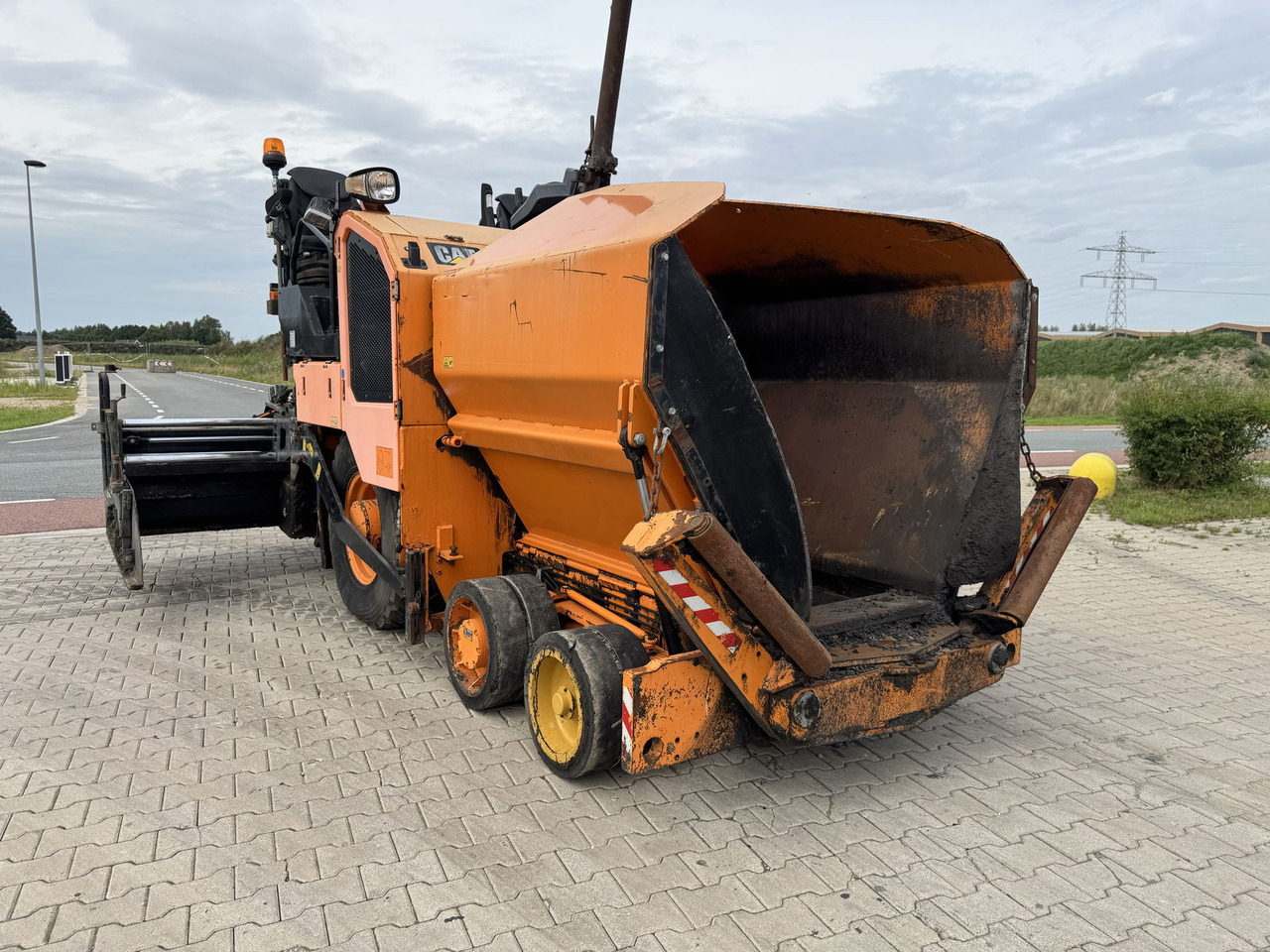 Caterpillar AP300F - Asfalta klājējs: foto 2 Caterpillar AP300F - Asfalta klājējs: foto 2