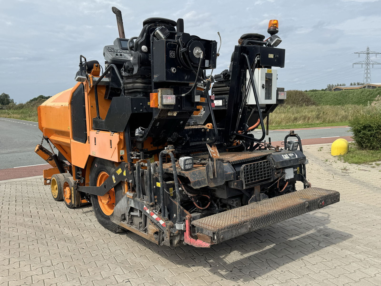 Caterpillar AP300F - Asfalta klājējs: foto 4 Caterpillar AP300F - Asfalta klājējs: foto 4