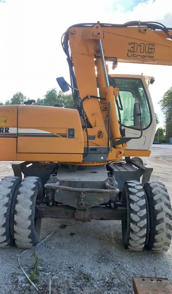 Liebherr A316 - Riteņu ekskavators: foto 3 Liebherr A316 - Riteņu ekskavators: foto 3