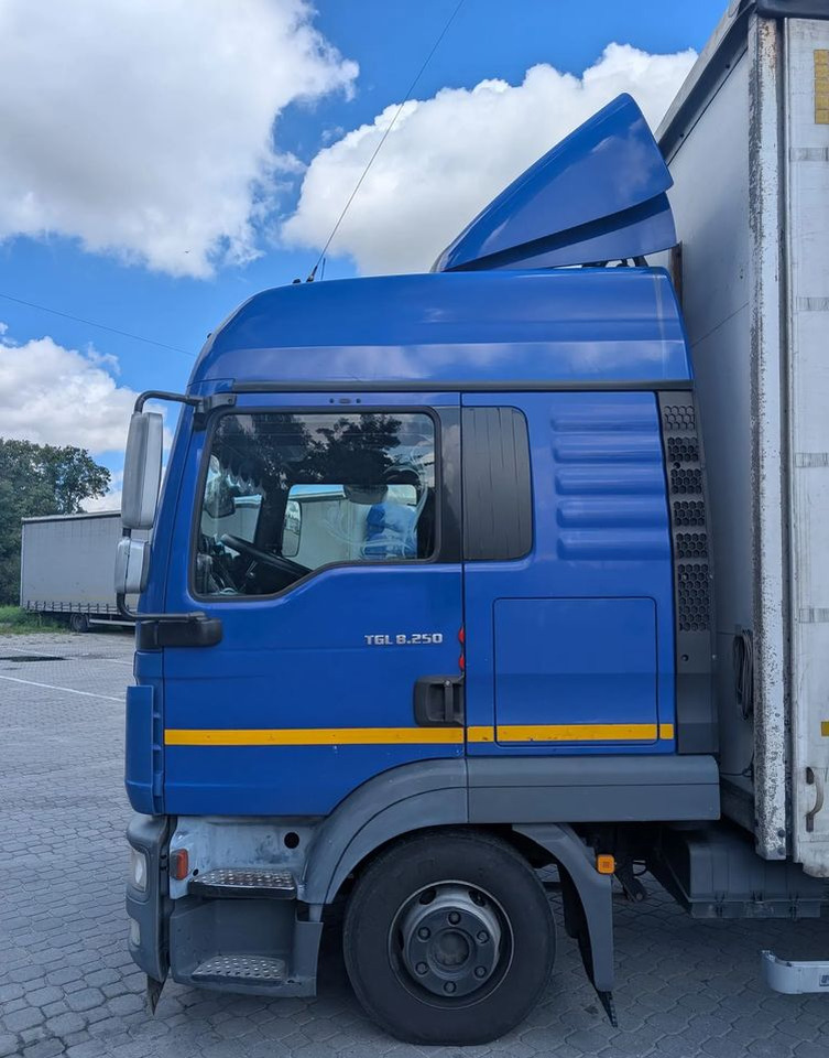 MAN TGL 8.250 - Kravas automašīna ar tentu: foto 2 MAN TGL 8.250 - Kravas automašīna ar tentu: foto 2