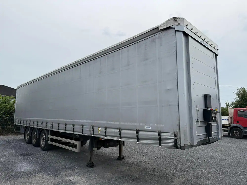 LeciTrailer Tautliner 3E20 Tautliner 3E20*1er essieu relevable*essieux SAF - Tenta puspiekabe: foto 4 LeciTrailer Tautliner 3E20 Tautliner 3E20*1er essieu relevable*essieux SAF - Tenta puspiekabe: foto 4