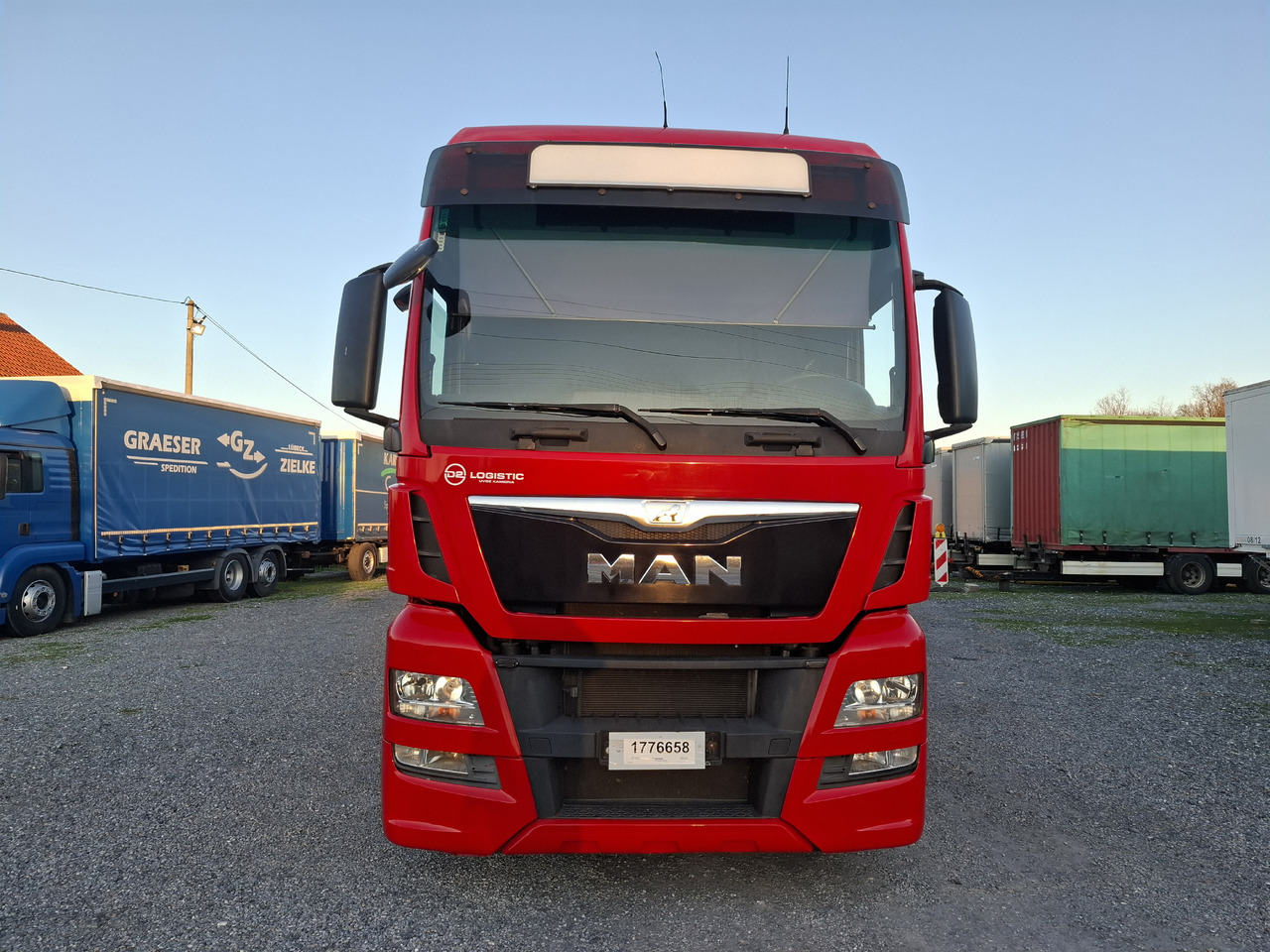 MAN TGX 26.440 E6 + SCHMITZ - Kravas automašīna ar tentu: foto 2 MAN TGX 26.440 E6 + SCHMITZ - Kravas automašīna ar tentu: foto 2