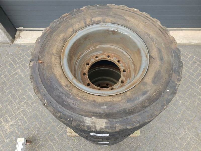Liebherr 10.00-20 - Tire/Reifen/Band - Riepas un diski - Celtniecības tehnika: foto 4 Liebherr 10.00-20 - Tire/Reifen/Band - Riepas un diski - Celtniecības tehnika: foto 4