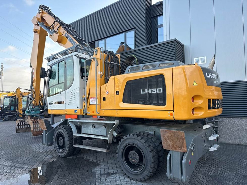 Liebherr LH 30 M - Atkritumu iekrāvējs: foto 3 Liebherr LH 30 M - Atkritumu iekrāvējs: foto 3