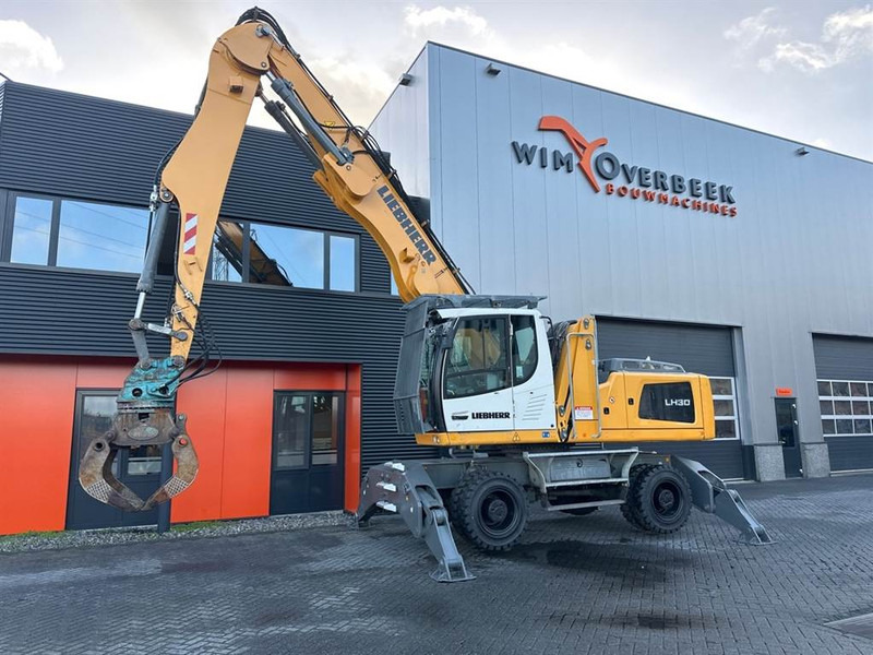Liebherr LH 30 M - Atkritumu iekrāvējs: foto 5 Liebherr LH 30 M - Atkritumu iekrāvējs: foto 5