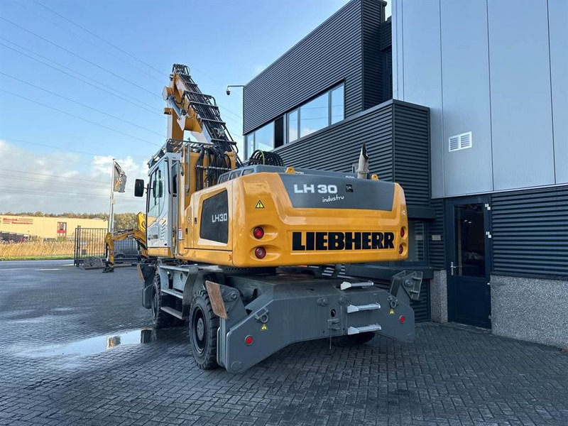 Liebherr LH 30 M - Atkritumu iekrāvējs: foto 4 Liebherr LH 30 M - Atkritumu iekrāvējs: foto 4