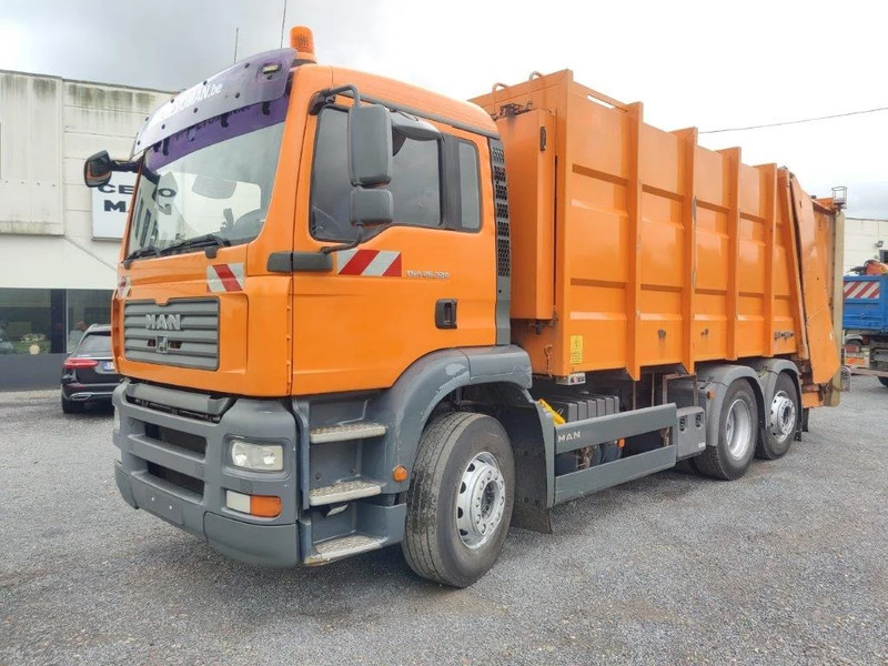 MAN TGA 26.320 6x2 garbage truck ZOELLER - Atkritumu vedējs: foto 1 MAN TGA 26.320 6x2 garbage truck ZOELLER - Atkritumu vedējs: foto 1