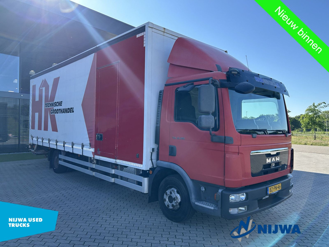 MAN TGL 12.180 4X2 Roldeur + Laaklep - Kravas automašīna ar tentu: foto 2 MAN TGL 12.180 4X2 Roldeur + Laaklep - Kravas automašīna ar tentu: foto 2