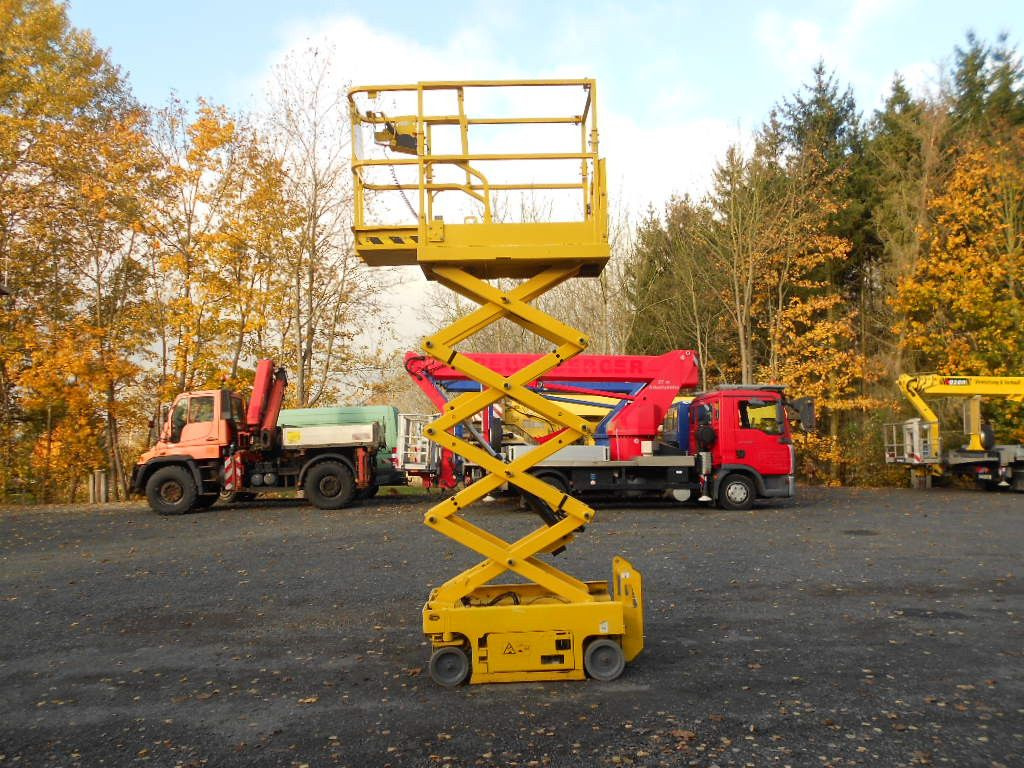 Genie GS 1330, Leichtscherenarbeitsbühne Genie 5,9 m - Autopacēlājs: foto 4 Genie GS 1330, Leichtscherenarbeitsbühne Genie 5,9 m - Autopacēlājs: foto 4