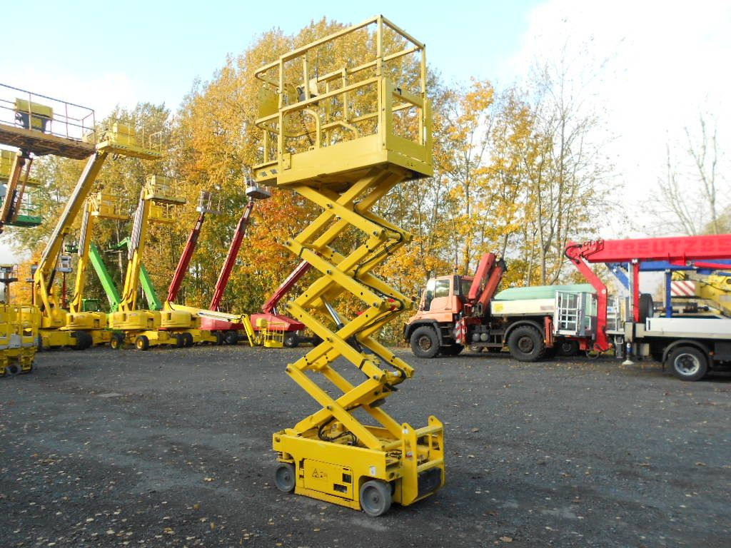 Genie GS 1330, Leichtscherenarbeitsbühne Genie 5,9 m - Autopacēlājs: foto 3 Genie GS 1330, Leichtscherenarbeitsbühne Genie 5,9 m - Autopacēlājs: foto 3