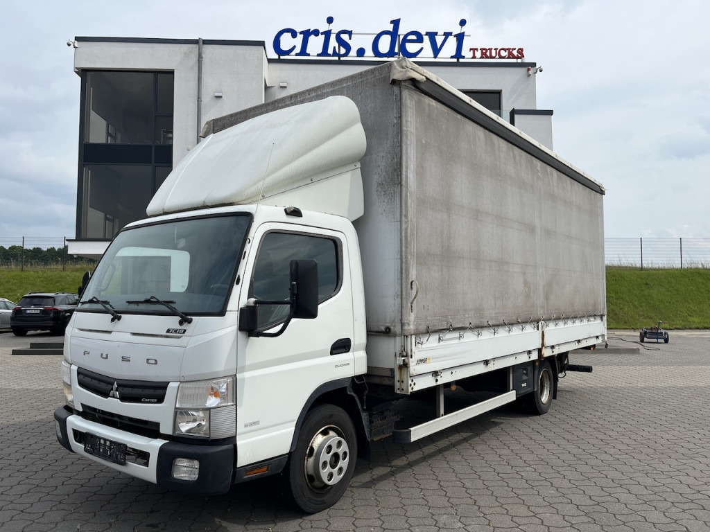 FUSO Canter 7C18 4x2 Ladebordwand - Furgons ar tentu: foto 1 FUSO Canter 7C18 4x2 Ladebordwand - Furgons ar tentu: foto 1