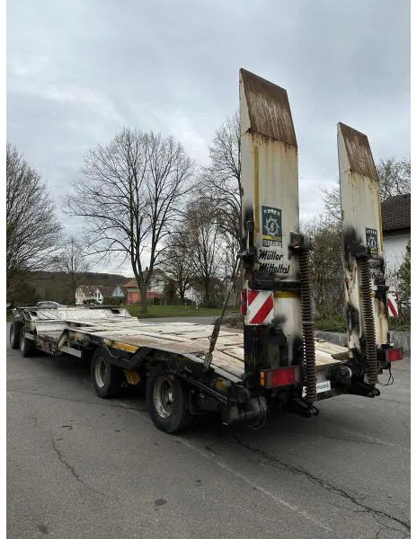 Müller-Mitteltal T4 4-Achs Tieflader Radmulden luftgefedert T4 4-Achs Tieflader Radmulden luftgefedert - Piekabe zema profila platforma: foto 5 Müller-Mitteltal T4 4-Achs Tieflader Radmulden luftgefedert T4 4-Achs Tieflader Radmulden luftgefedert - Piekabe zema profila platforma: foto 5