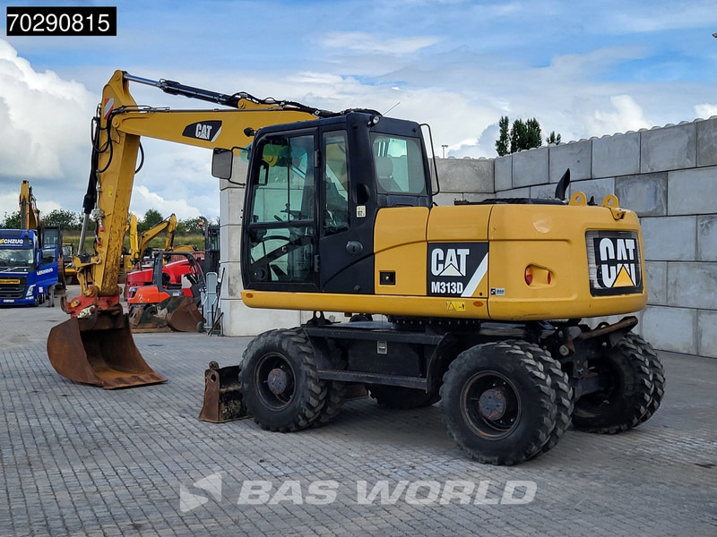 Caterpillar M313 D - Riteņu ekskavators: foto 2 Caterpillar M313 D - Riteņu ekskavators: foto 2