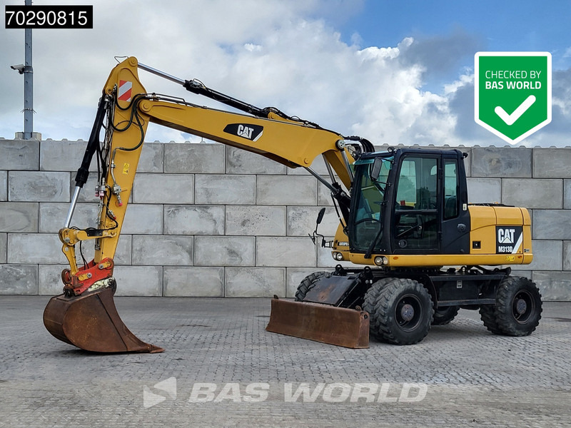 Caterpillar M313 D - Riteņu ekskavators: foto 1 Caterpillar M313 D - Riteņu ekskavators: foto 1