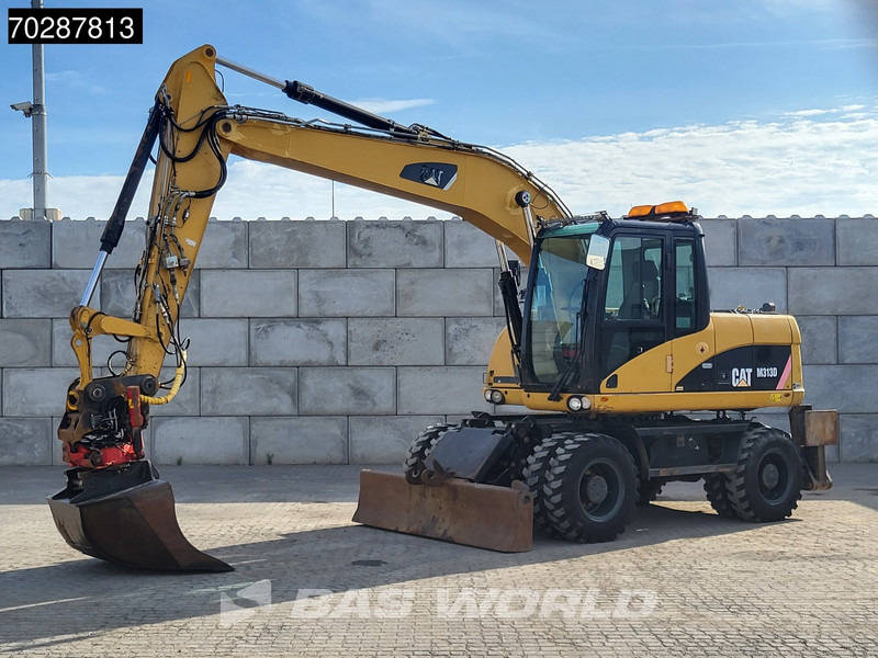 Caterpillar M313 D OUTRIGGERS + BLADE - Riteņu ekskavators: foto 2 Caterpillar M313 D OUTRIGGERS + BLADE - Riteņu ekskavators: foto 2
