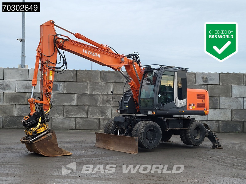 Hitachi ZX140W -3 - Riteņu ekskavators: foto 1 Hitachi ZX140W -3 - Riteņu ekskavators: foto 1