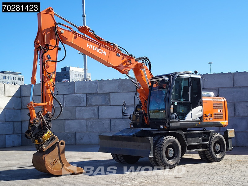 Hitachi ZX140W -5 OUTRIGGERS + BLADE - Riteņu ekskavators: foto 2 Hitachi ZX140W -5 OUTRIGGERS + BLADE - Riteņu ekskavators: foto 2