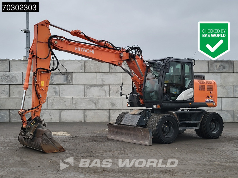 Hitachi ZX140W -6 - Riteņu ekskavators: foto 1 Hitachi ZX140W -6 - Riteņu ekskavators: foto 1