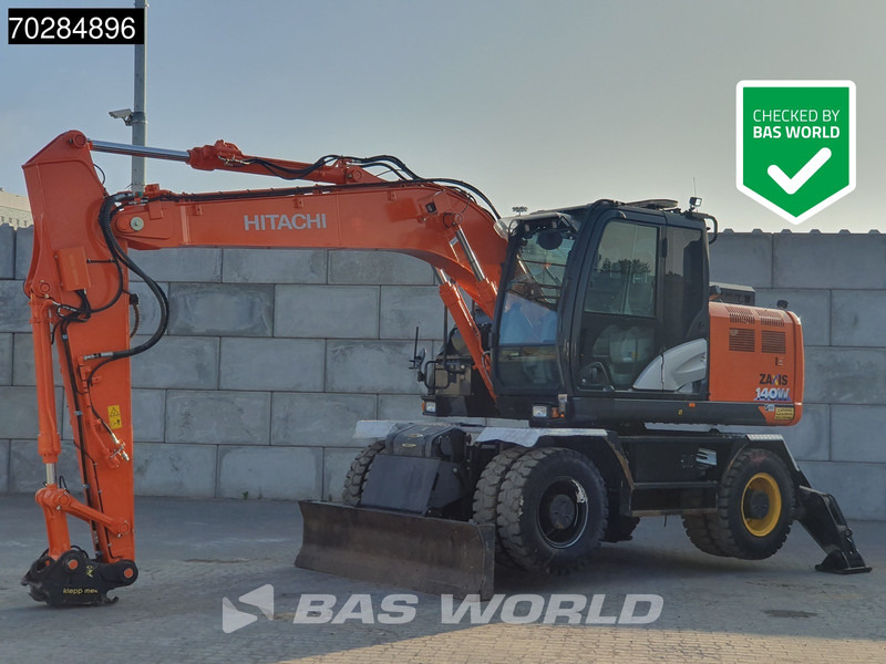 Hitachi ZX140W -6 OUTRIGGERS + BLADE - Riteņu ekskavators: foto 1 Hitachi ZX140W -6 OUTRIGGERS + BLADE - Riteņu ekskavators: foto 1