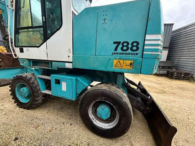 Riteņu ekskavators Case 788-P: foto 7