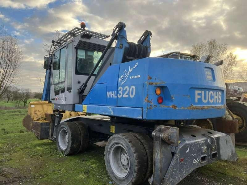 Atkritumu iekrāvējs Fuchs MHL 320: foto 6