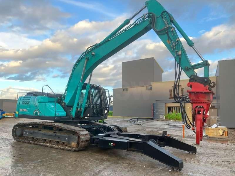 Kobelco SK210LC-10E - Atkritumu iekrāvējs: foto 1 Kobelco SK210LC-10E - Atkritumu iekrāvējs: foto 1