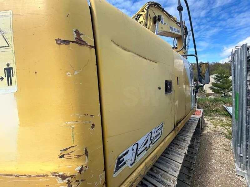Kāpurķēžu ekskavators New Holland E145: foto 14