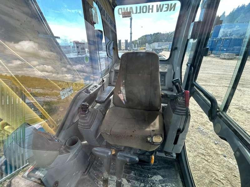 Kāpurķēžu ekskavators New Holland E145: foto 22
