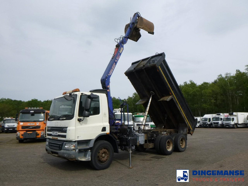 DAF CF 75.310 6x4 RHD tipper + HMF 1144 K-1 + grapple - Kravas auto ar manipulatoru: foto 1 DAF CF 75.310 6x4 RHD tipper + HMF 1144 K-1 + grapple - Kravas auto ar manipulatoru: foto 1