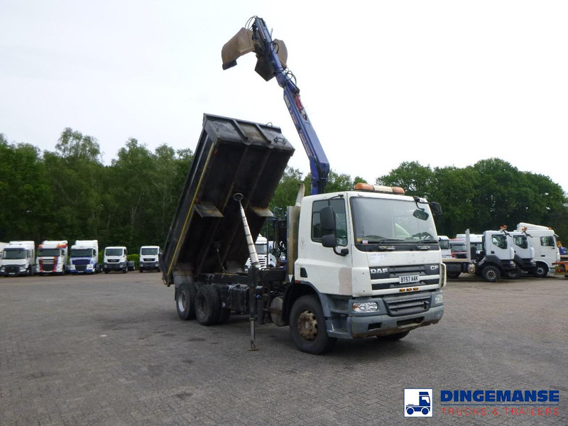 DAF CF 75.310 6x4 RHD tipper + HMF 1144 K-1 + grapple - Kravas auto ar manipulatoru: foto 2 DAF CF 75.310 6x4 RHD tipper + HMF 1144 K-1 + grapple - Kravas auto ar manipulatoru: foto 2
