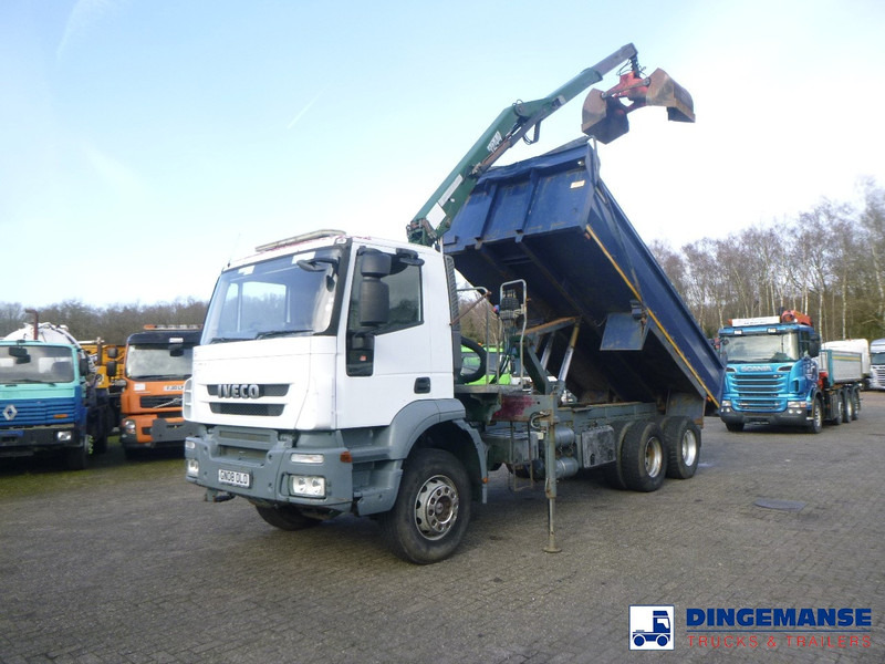Iveco AD260T33 6X4 RHD tipper + HMF crane - Kravas auto ar manipulatoru: foto 1 Iveco AD260T33 6X4 RHD tipper + HMF crane - Kravas auto ar manipulatoru: foto 1