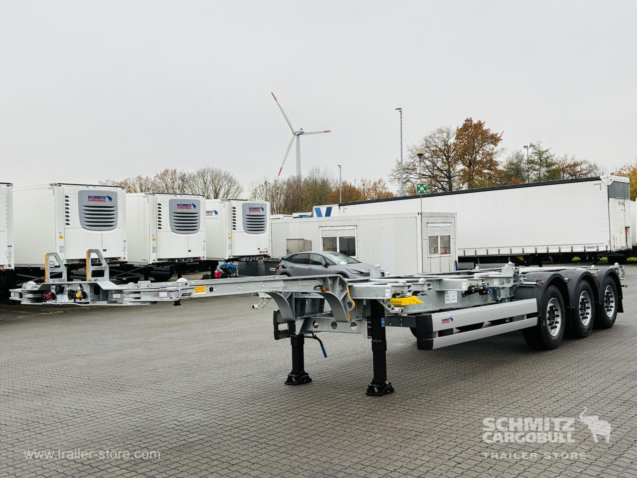 SCHMITZ Auflieger Containerfahrgestell Standard - Puspiekabe noņemamā virsbūve/ Konteineru vedējs: foto 1 SCHMITZ Auflieger Containerfahrgestell Standard - Puspiekabe noņemamā virsbūve/ Konteineru vedējs: foto 1