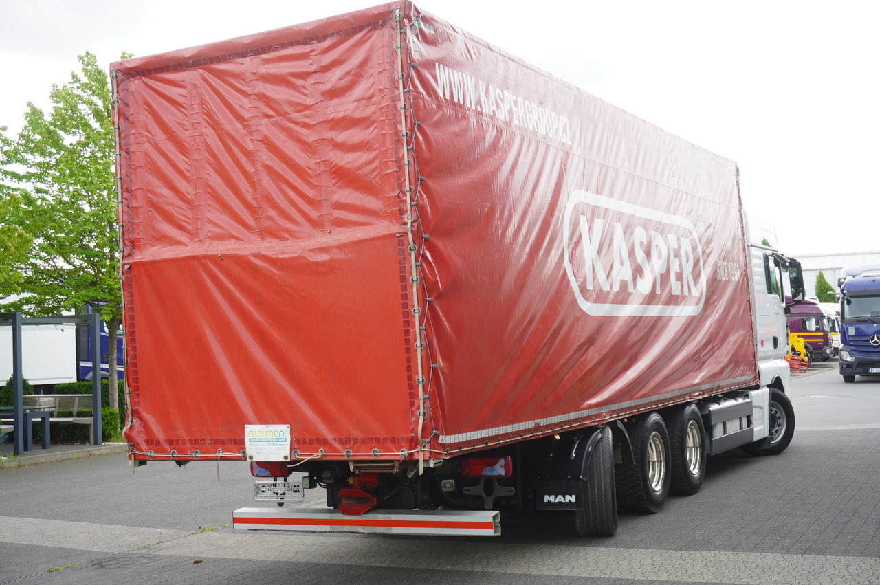 MAN TGX 35.580 E6 8x4 /4 / 23 EPAL tarp superstructure / 4th axle steered - Kravas automašīna ar tentu: foto 4 MAN TGX 35.580 E6 8x4 /4 / 23 EPAL tarp superstructure / 4th axle steered - Kravas automašīna ar tentu: foto 4