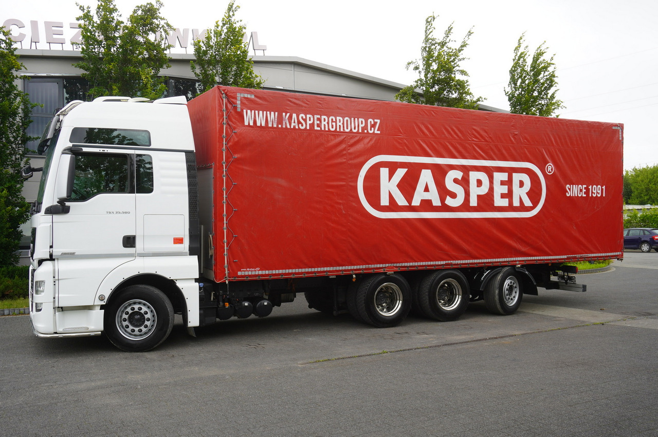 MAN TGX 35.580 E6 8x4 /4 / 23 EPAL tarp superstructure / 4th axle steered - Kravas automašīna ar tentu: foto 2 MAN TGX 35.580 E6 8x4 /4 / 23 EPAL tarp superstructure / 4th axle steered - Kravas automašīna ar tentu: foto 2