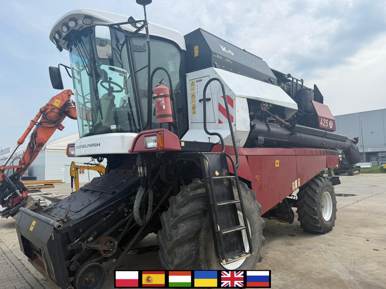 ROSTSELMASH VECTOR 425 RSM-101 grain harvester + Header 5 m + rapeseed harvesting extension / 2300 MTH - Labības kombains: foto 1 ROSTSELMASH VECTOR 425 RSM-101 grain harvester + Header 5 m + rapeseed harvesting extension / 2300 MTH - Labības kombains: foto 1