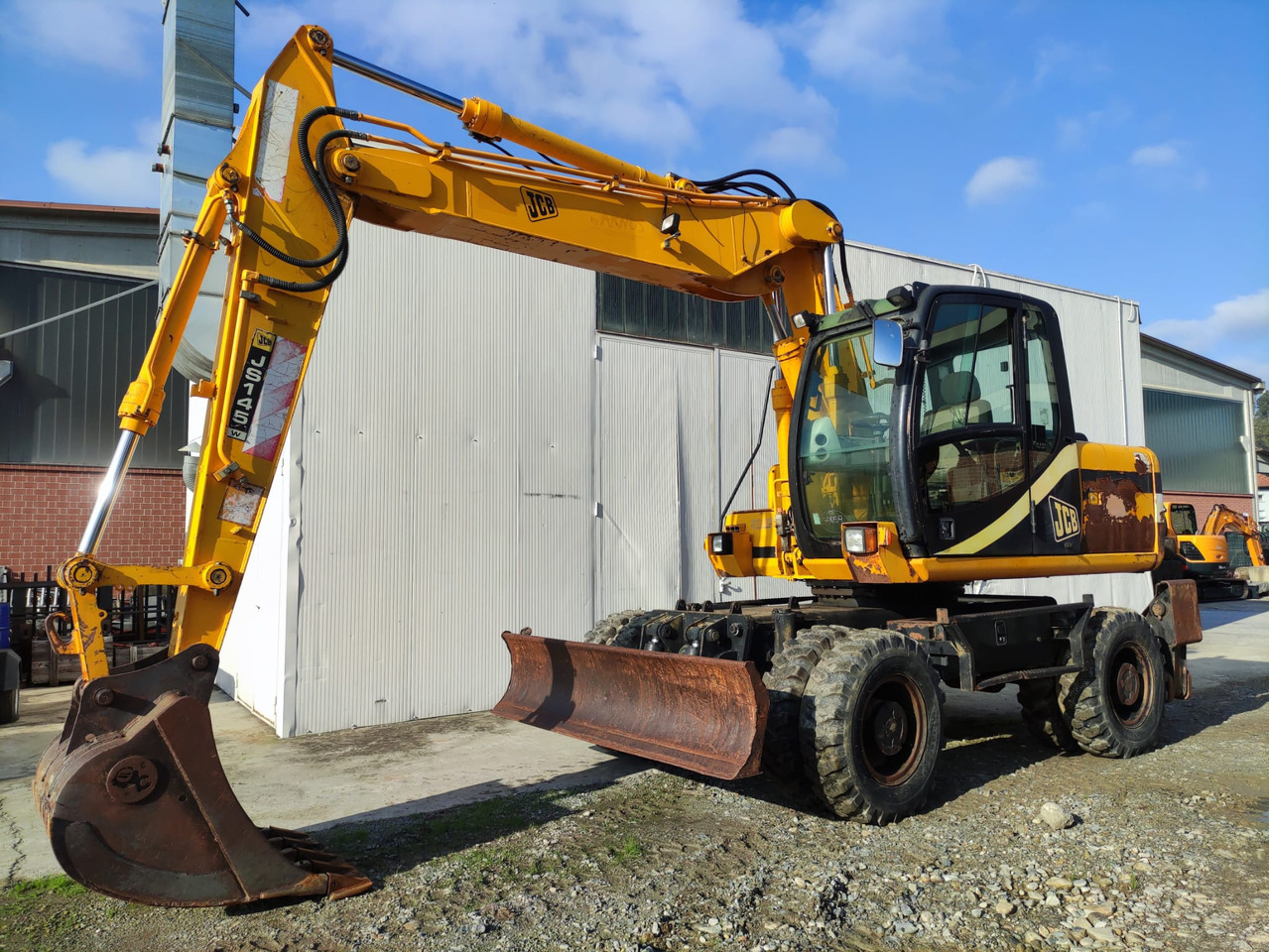 JCB JS145W - Riteņu ekskavators: foto 1 JCB JS145W - Riteņu ekskavators: foto 1