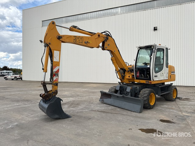 2005 Liebherr A311 Pelle Sur Pneus Wheel Excavator - Riteņu ekskavators: foto 2 2005 Liebherr A311 Pelle Sur Pneus Wheel Excavator - Riteņu ekskavators: foto 2