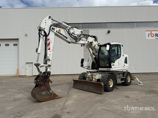2013 Liebherr A 914 Compact Pelle Sur Pneus Wheel Excavator - Riteņu ekskavators: foto 1 2013 Liebherr A 914 Compact Pelle Sur Pneus Wheel Excavator - Riteņu ekskavators: foto 1
