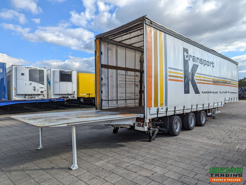 Burg BPO 12-27 SKNXX Semi Dieplader 3-Assen BPW - Schuifzeilen/Schuifdak /Hefdak - Hydraulische Oprijklep 9000KG - Puspiekabe zema profila platforma: foto 1 Burg BPO 12-27 SKNXX Semi Dieplader 3-Assen BPW - Schuifzeilen/Schuifdak /Hefdak - Hydraulische Oprijklep 9000KG - Puspiekabe zema profila platforma: foto 1