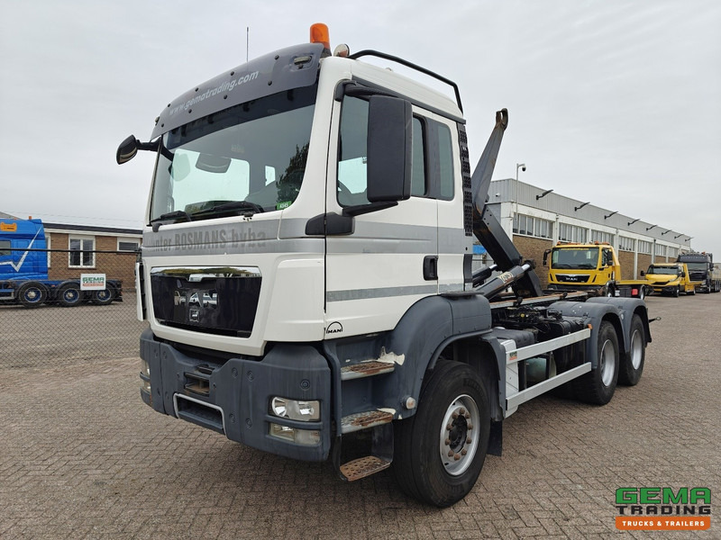 MAN TGS-TGX 26.440 6x4 Dagcabine Euro5 - AJK 20T HaakarmSysteem - Volledig Bladgeveerd - Naafreductie - Handgeschakeld - Pacēlājs ar āķi: foto 1 MAN TGS-TGX 26.440 6x4 Dagcabine Euro5 - AJK 20T HaakarmSysteem - Volledig Bladgeveerd - Naafreductie - Handgeschakeld - Pacēlājs ar āķi: foto 1